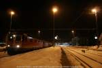 Re 6/6 11641 *Moutier* + Re 4/4  11288 warten mit dem 45714 aus Hall i. Tirol (A) in Sargans auf die Vorausfahrt des IR aus Chur.
19.02.09