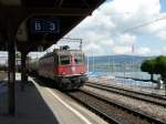 SBB - Re 6/6  11606 mit Gterzug bei der durchfahrt im Bahnhof Wdenswil am 10.06.2011