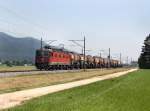 Die Re 6/6 11607 mit einem Kesselzug am 28.06.2011 unterwegs bei Oensingen.