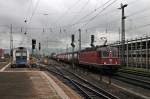 Durchfahrt am 02.05.2014 von SBB CFF FFS Re 6/6 11653  Gümligen  mit einem gemischten Güterzug in Basel Bad Bf gen Weil am Rhein.