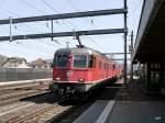 SBB - Re 6/6  11677 mit Re 4/4 vor Güterzug bei der durchfahrt im Bahnhof Rothrist am 30.03.2014