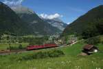 Re 4/4 II 11162 und Re 6/6 11678 befinden sich am 03.07.2014 zwischen Erstfeld und Silenen.