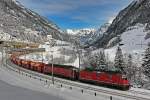 Re 10/10 bestehend aus der Re 4/4 II 11183 und der Re 6/6 11643 Laufen,fahren mit einem Holcim Sandzug den Gotthard hinauf.Bild wassen 3.2.2015