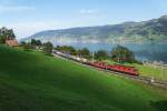 Re 6/6 11680 und Re 4/4 II 11329 fahren am 03.10.2015 von Immensee Richtung Arth-Goldau.