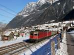 Die Re 6/6 11608 und die Re 4/4 11188 mit einem Stahlzug am 22.01.2016 unterwegs bei Silenen.