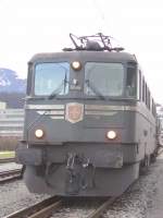 Zu Gast in der bergabeanlage in Domat-Ems:  Ae 6/6 11404  Luzern  als Zug 64744 Domat-Ems zum RBL.