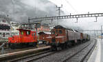 Gotthard-Bahntage: Die morgendliche Lokomotivenparade mit Ae 8/14 11801, Be 4/6 12332, Ce 6/8 14201 rollt bei strömendem Regen zum Aufbau der Fahrzeugausstellung im Bahnhof Erstfeld.