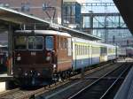 bls - Re 4/4 194 im Pendelzugsdienst am schluss bei der Ausfahrt aus dem Bahnhof von Spiez am 13.09.2007