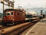 161  Re 4/4 der BLS mit IC Monteverdi Venezia-Basel SBB auf Bahnhof Spiez am 26-07-95.