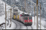 Aus dem Archiv...Gotthardbahn<br>
Re 4/4 II 11339 und eine Re 6/6 am 7. Februar 2015 mit einem UKV-Zug auf der obersten Ebene bei Wassen.