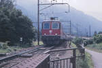 Die frisch revidierte Re 4/4 II 11195 befährt mit einem IC der Deutschen Bundesbahn die Rheinbrücke bei Bad Ragaz in Graubünden.