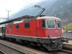 SBB - Re 4/4 11143 in Erstfeld vor Schnellzug am 19.04.2008