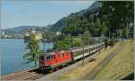 Mittlerweile ein Klassiker, doch immer wieder ein Foto wert, besonders wenn eine Re 4/4 II die Szene bestimmt: Re 4/4 II 11304 mit dem IR 1721 von Genve Aroport nach Brig beim Chteau de Chillon.
14. Juni 2012