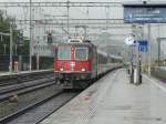 SBB - Re 4/4 11114 mit Schnellzug bei der durchfahrt im Bahnhof Liestal am 28.07.2012