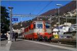 Die SBB Re 4/4 II 11109  Swiss-Express  mit em IR 2272 kurz vor der planmäßigen. Abfahrt in Locarno.
19. März 2014 