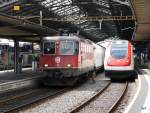 SBB - Re 4/4  11291 mit Güterzug bei der durchfahrt im Bahnhof Lausanne am 19..07.2015