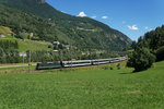 Die grüne Re 4/4 II 11161 zieht am 19.07.2016 einen Gotthard-IR von Rodi-Fiesso Richtung Ambri-Piotta.