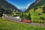 Re 4/4 II 11157 fährt mit dem IR 2425 (Zürich HB - Locarno), in der Wattinger Kurve, den Gotthard hinauf.
Aufgenommen am 19.7.2016.