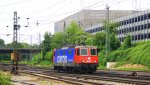 421 383-1 von SBB Cargo kommt als Lokzug aus Richtung Kln,Aachen-Hbf und fhrt in Aachen-West ein bei Sonne und Wolken am Abend vom 11.6.2013.