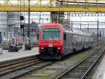 SBB - Unterwegs als RE die Lok 450 014-6 bei der einfahrt im HB Zrich am 27.04.2013