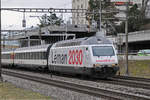 Re 460 075-5, mit der Léman 2030 Werbung, fährt Richtung Bahnhof Muttenz. Die Aufnahme stammt vom 28.12.2017.