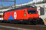 Re 460 058-1 mit der Werbung für das 100 Jährige bestehen des Schweizer National Zirkus Knie, fährt Richtung Bahnhof Muttenz. Die Aufnahme stammt vom 27.02.2019.