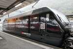 Die Re 460 046 mit Vollwerbung für den Lokführer Beruf am 26.9.24 im Bahnhof Interlaken Ost.