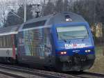 Re 460 005-2 mit der Werbung  Rail Away  am 20.3.05 auf dem Streckenabschnitt Rotkreuz - Root  