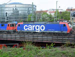482 034-6 der SBB Cargo mit 421 397-1 im Schlepptau. (Dresden, April 2014)