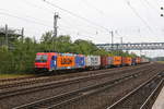 482 039 von  LOCON  stand am 28. Juni 2020 mit einem Containerzug im Bahnhof von Buchholz/Heide.