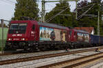 Rübenexpress: 482 049-0 und 047-8 ziehen den langen 34 Waggon umfassenden leeren Zug aus Lindau Reutin.