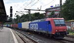 SBB Cargo International AG, Olten [CH] mit der  482 024-7  [NVR-Nummer: 91 85 4482 024-7 CH-SBBC] und einem Containerzug Richtung Hamburger Hafen am 19.07.24 Höhe Bahnhof Hamburg-Harburg.