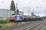482 018 SBB Cargo mit Kesselwagen in Hrth-Kalscheuren am 13.7.2012