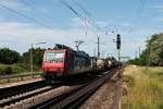 Durchfahrt am 06.06.2014 von Re 482 008-0 von SBB Cargo mit einem Containerzug in Orschweier auf der KBS 703 in Richtung Freiburg.