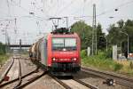 Mit dem BASF-Zug 49069 (Ludwigshafen BASF Ubf - Basel SBB Rbf) fuhr am 23.07.2014 SBB Cargo Re 482 029-6 in Richtung Schweiz durch Müllheim (Baden).