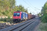 482 038 erreichte am 4.9.15 mit einem Güterzug nach Süden den aufgelassenen Haltepunkt Ermetzhofen. Rechts hinten steht ein Schienen-LKW im Knauf-Werksanschluss.