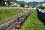 SBB CARGO:
Güterzug mit Re 20/20 bei Liestal am 28. Juni 2018.
An vierter Stelle ist die letzte grüne Re 6/6 erkennbar.
Foto: Walter Ruetsch
