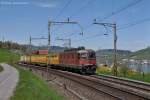 Re 6/6 11601 mit Postzug am 26.04.2012 bei Immensee