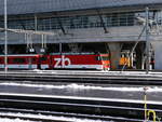 zb - Ausfahrende HGe 4/4 101 961-1 im Bahnhof Luzern am 09.12.2017