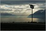 Noch ein Stationsschild, diesmal von Grandvaux, vor der Stimmungvollen Ambiente am Genfersee. 
4. Jan. 2013