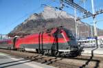 Railjet nach Wien-Westbahnhof mit Taurus Lok 1116 202-3 vor der Kulisse des Gonzen am 06.02.14 in Sargans/SG.