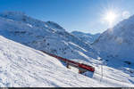 MGB HGe 4/4 II 107 mit Regio Disentis - Andermatt am 10. Januar 2021 zwischen Nätschen und Andermatt.