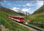 Am Oberalppass ein ABt Steuerwagen Richtung Andermatt.