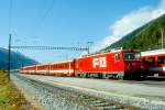 MGB FO-GLACIER-EXPRESS A 1902 von Brig nach Disentis am 10.10.1996 in Oberwald mit FO Zahnrad-E-Lok HGe 4/4II 105 - FO B 4253 - FO B 4270 - FO B 4269 - FO B 4268 - FO AB 4172. Hinweis: Fahrzeuge noch alte Lackierung!
