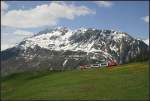 In den Bergen -     Ein Glacier-Express hat die Steilstrecke von Andermatt nach Nätschen fast geschafft.