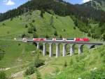 HGe 4/4 II 104 mit  Glacier-Express  bei Bugnei Viadukt - 18/06/2013