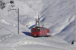 Ein Deh 4/4  kommt mit einem Autozug aus Sedrun vom Oberalppass herunter.(10.01.2009)