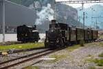 Am 26.05.2024 fährt der Dampfzug der Brünigdampfbahen mit der Zahnradlock vom Brünigpass in Meiringen BE ein. Die Tallok G 3/4 wartet schon auf einem Nebengeleise. Sie bringt den Zug dann nach Interlaken Ost.