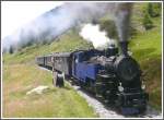 DFB Zug 160 mit HG 3/4 1 oberhalb von Oberwald. (21.07.2011)