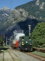 FM Dampfextrazug fr GRAUBNDEN TOURS V3215 von Cama nach Castione-Arbedo vom 29.08.1997 in Grono mit Dampflok G 3/4 1 - B 21 - B 2060 - A 1102. Links ist noch ein Teil der heute unbenutzten Gleiswaage zu sehen.